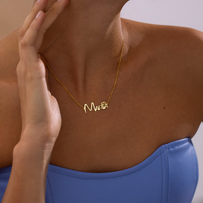 Graffiti name necklace in 14K gold, worn on model