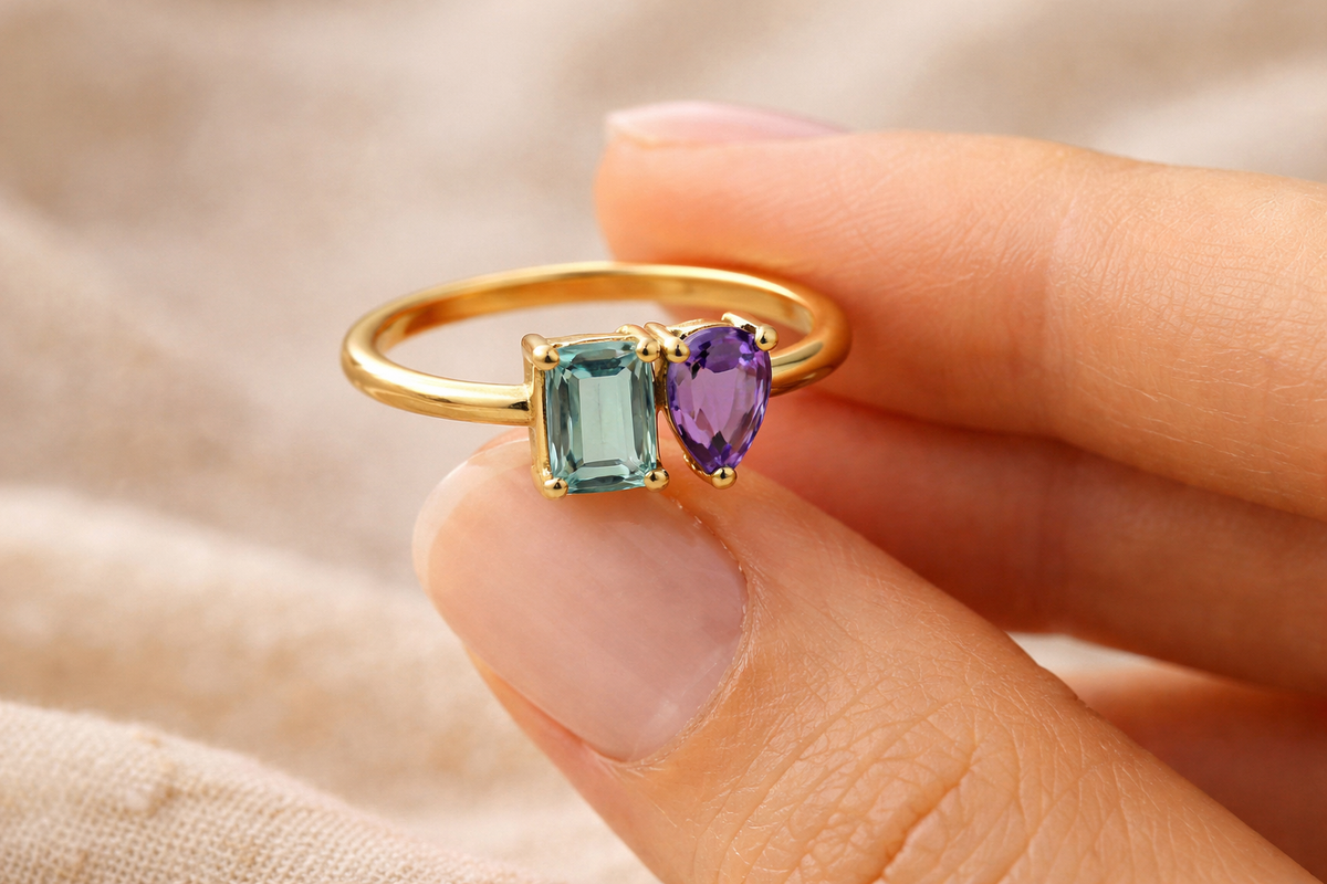 Custom two stone birthstone ring, side view with cubic zirconia stones
