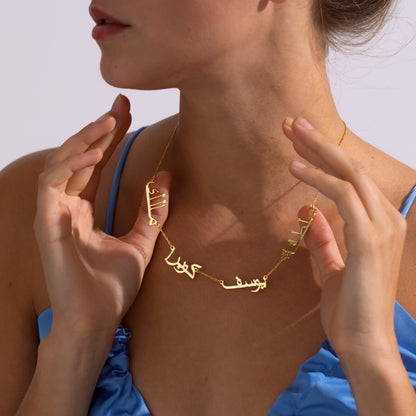 Multiple Arabic name necklace for up to 4 names, 14K gold vermeil, worn on model, close-up of the Arabic name pendant (6)